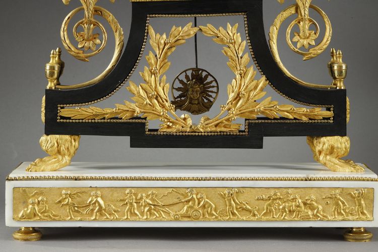 LARGE DIRECTOIRE CLOCK IN PATINATED AND GILT BRONZE