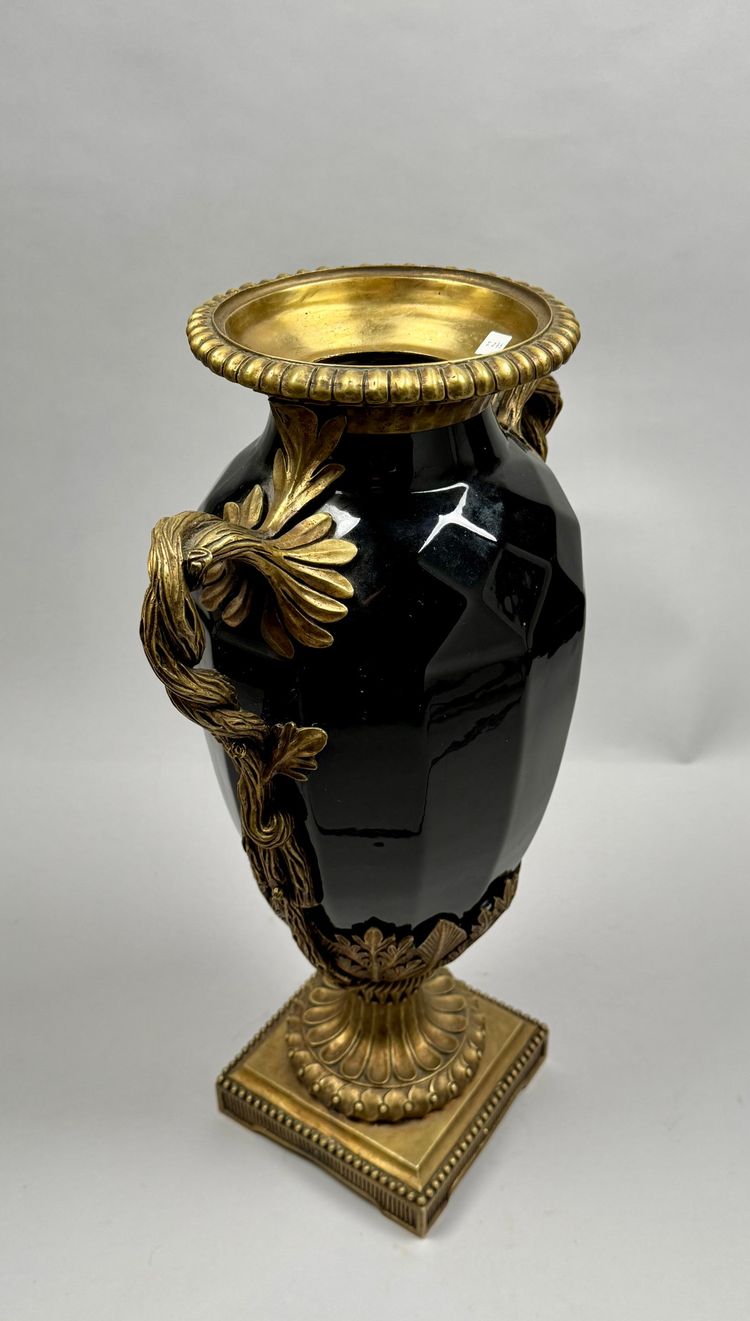 Large black ceramic vase with gilded bronze handles, 19th century.
