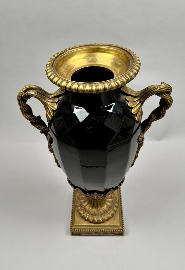 Large black ceramic vase with gilded bronze handles, 19th century.