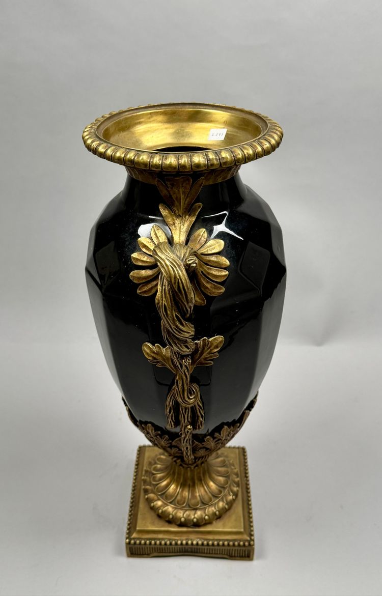 Large black ceramic vase with gilded bronze handles, 19th century.