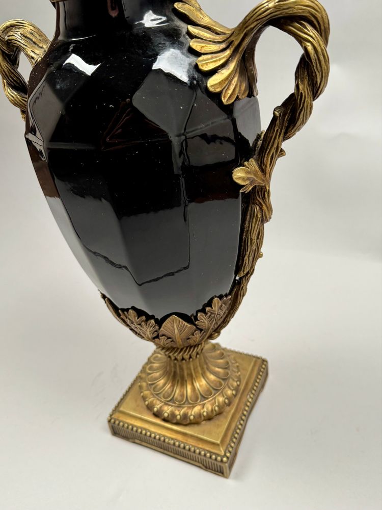 Large black ceramic vase with gilded bronze handles, 19th century.