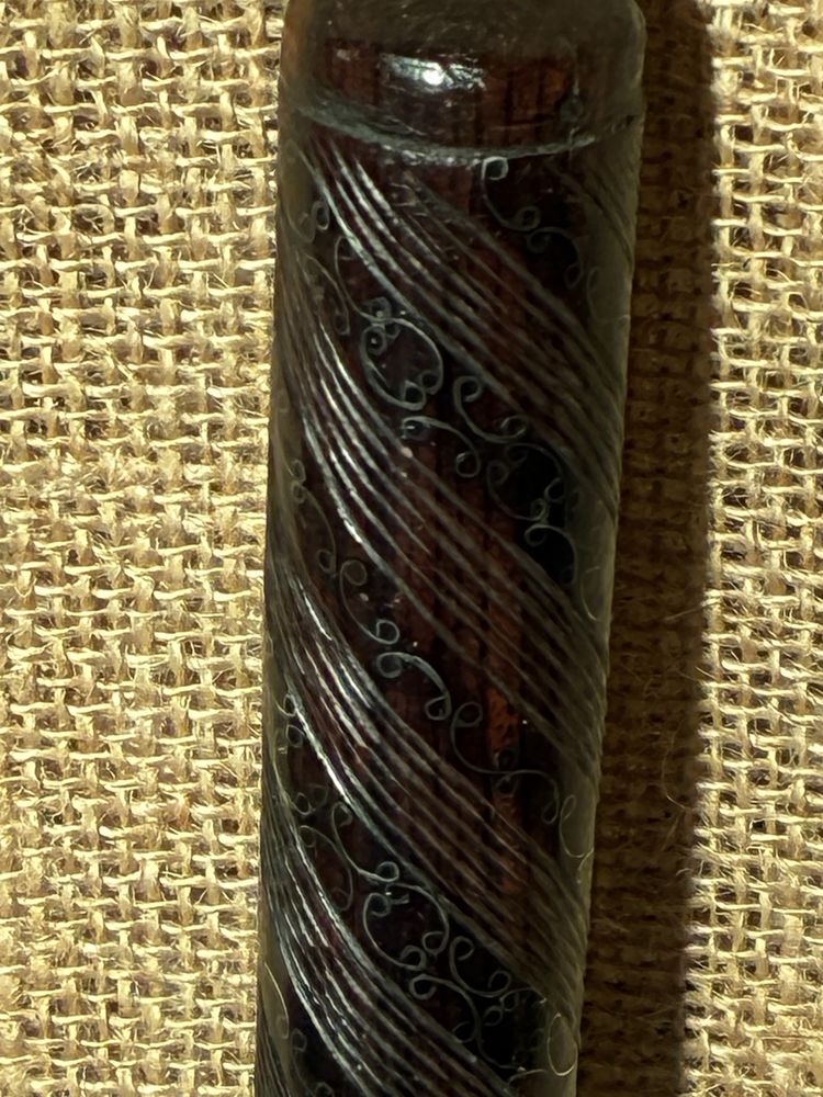 Mahogany cane inlaid with silver wire, 19th century