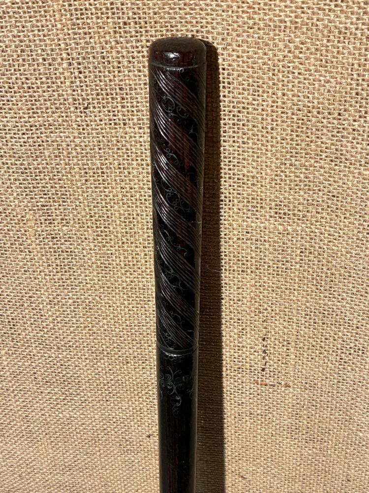 Mahogany cane inlaid with silver wire, 19th century