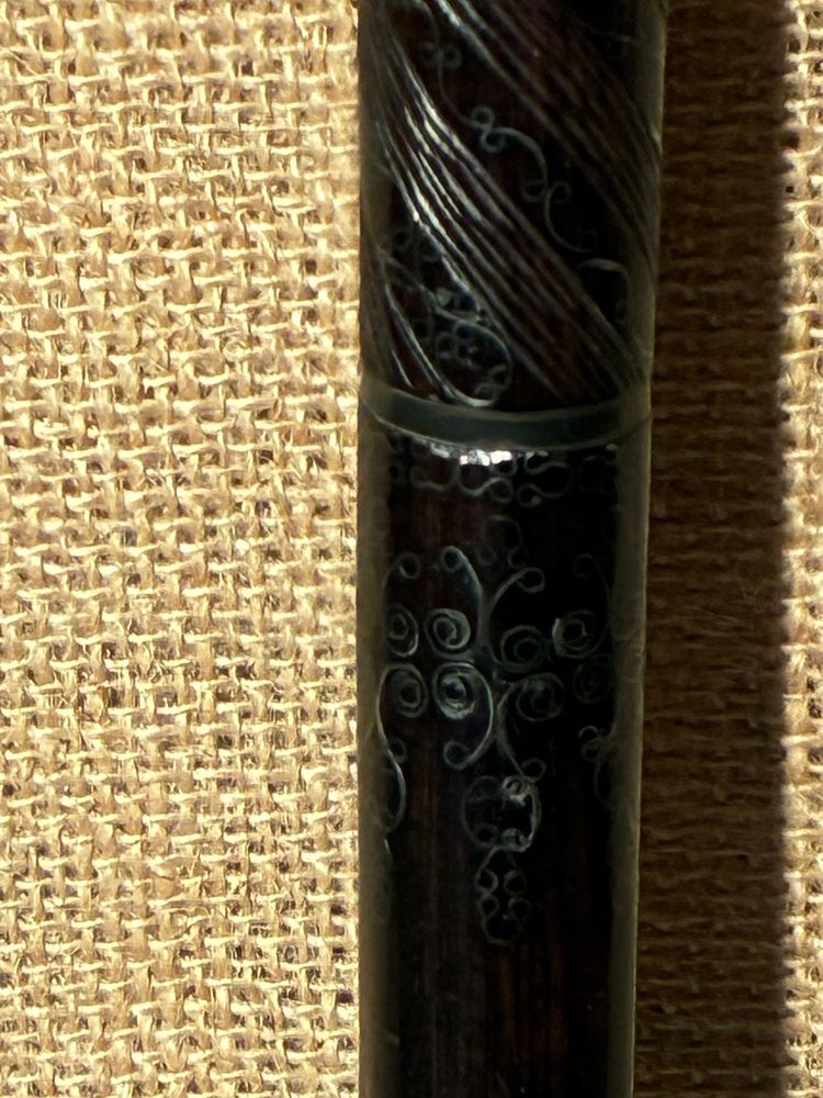 Mahogany cane inlaid with silver wire, 19th century