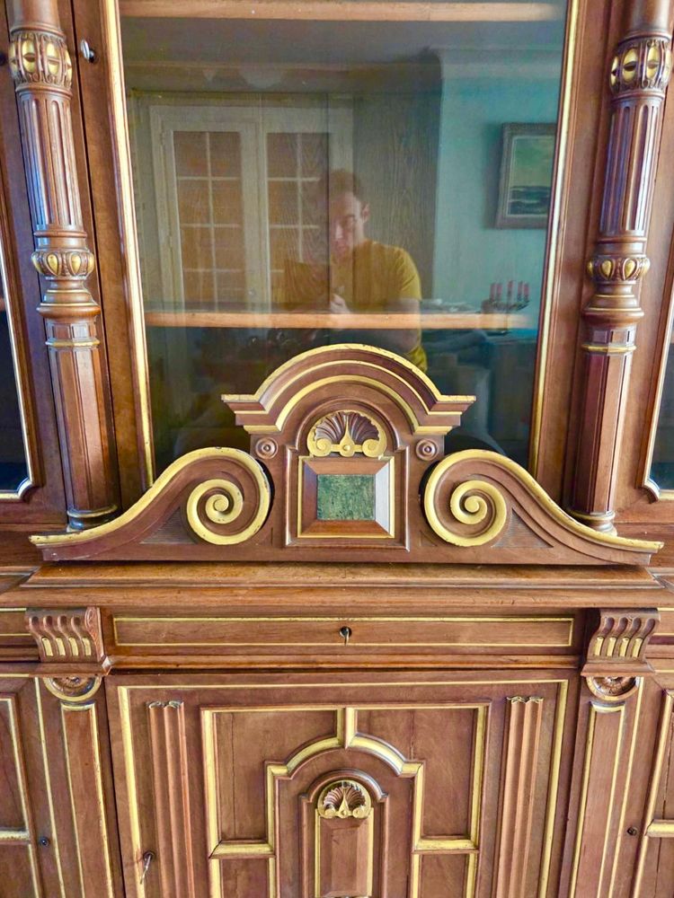 Light walnut bookcase with arched doors