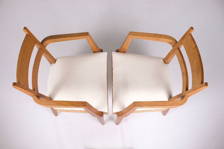 René-Jean Caillette armchairs in blond oak.