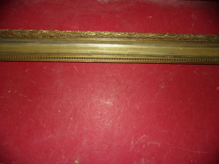 19th-century frame, in gilded wood.