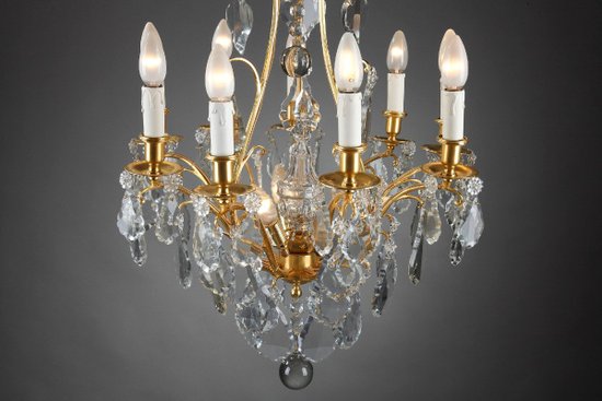 Eight Arm Gilt Bronze Chandelier With Tassels