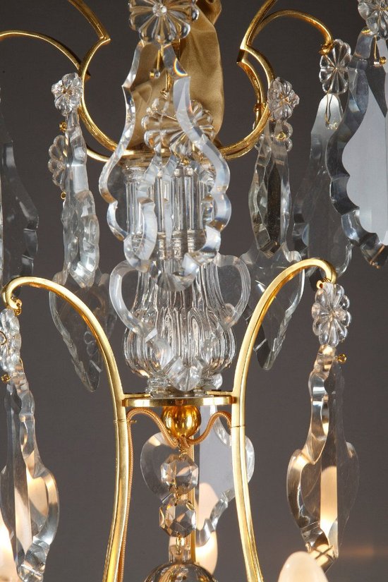 Eight Arm Gilt Bronze Chandelier With Tassels
