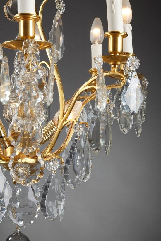 Eight Arm Gilt Bronze Chandelier With Tassels