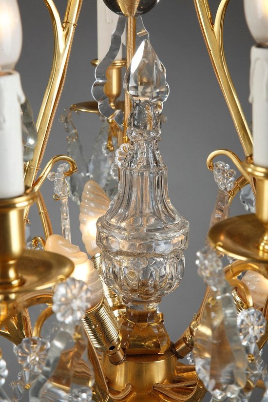 Eight Arm Gilt Bronze Chandelier With Tassels