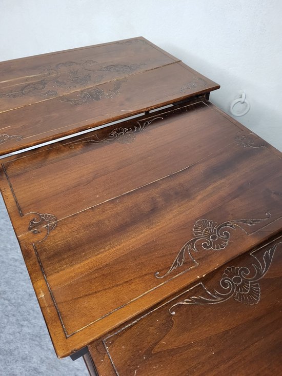 Pyrographed nesting tables XXth century
