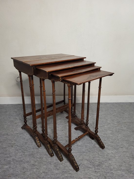 Pyrographed nesting tables XXth century