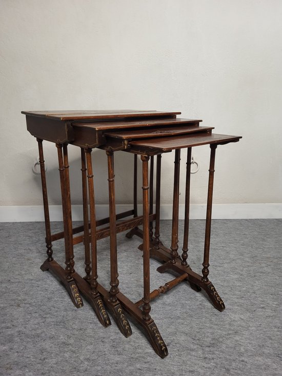 Pyrographed nesting tables XXth century
