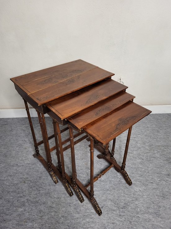 Pyrographed nesting tables XXth century