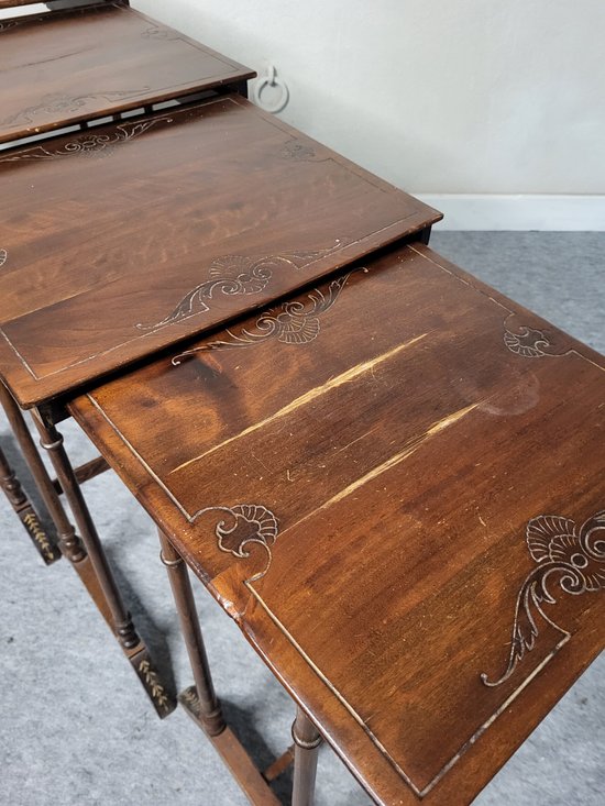 Pyrographed nesting tables XXth century