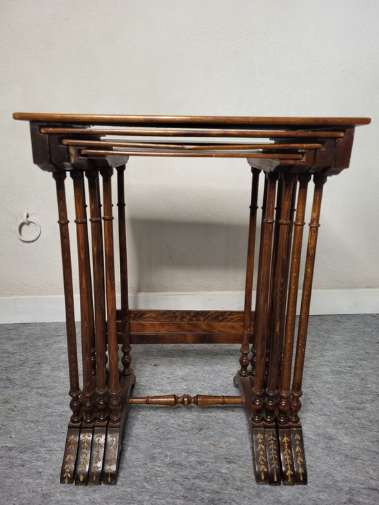 Pyrographed nesting tables XXth century