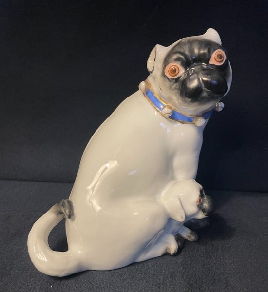 Pug and her little one in porcelain. Samson after Meissen