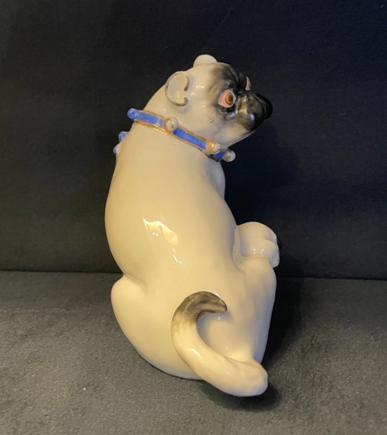 Pug and her little one in porcelain. Samson after Meissen