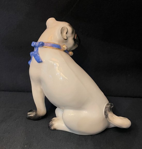 Pug and her little one in porcelain. Samson after Meissen