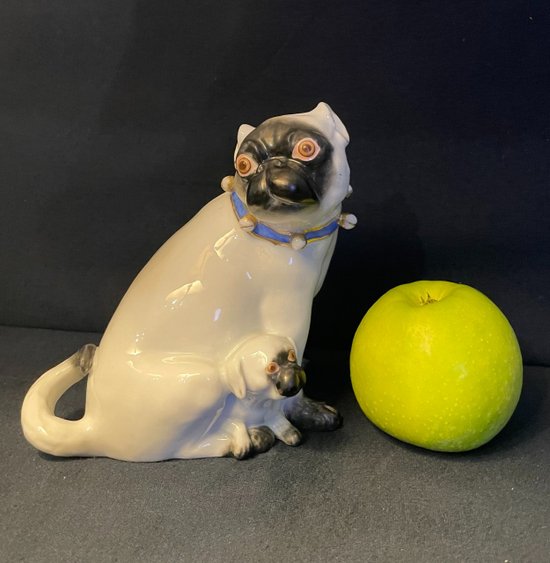 Pug and her little one in porcelain. Samson after Meissen