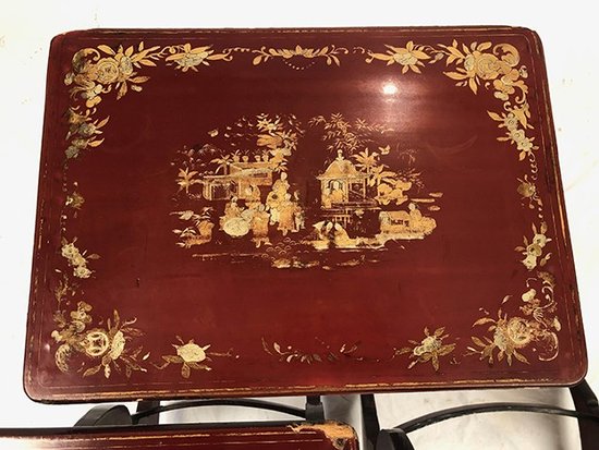 Set of three red lacquered nesting tables with gold decoration in the Asian style, 19th century