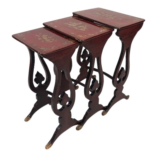 Set of three red lacquered nesting tables with gold decoration in the Asian style, 19th century