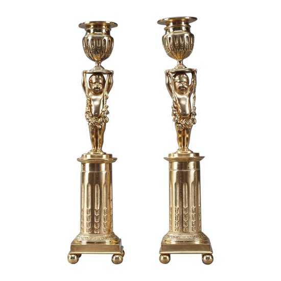 Gilded Bronze Pedestal Candleholders with Putti decoration, 19th Century