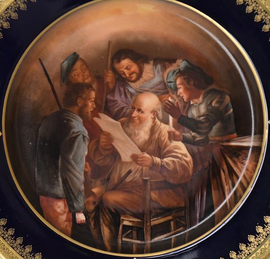 Plat en porcelaine de Limoges atelier de J. Balleroy décor peint scène de lecture à la bougie