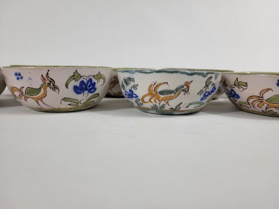 9 earthenware cups from Moustiers Ferrat XVIIIth century