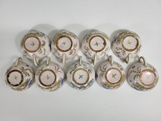 9 earthenware cups from Moustiers Ferrat XVIIIth century
