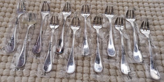 & 2 Christofle oyster forks, "Perles" model, silver plated