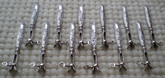 Box of 12 ribbed sleeves silver sleeves filled with art nouveau decor