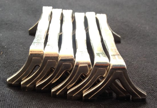 6 versilberte Messerhalter