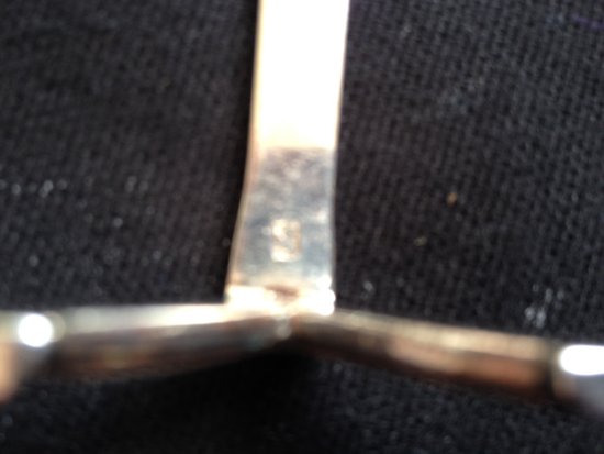 6 versilberte Messerhalter