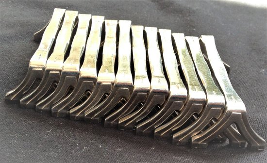12 versilberte Messerhalter