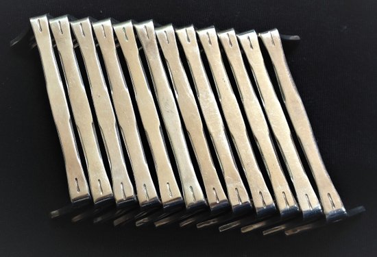12 versilberte Messerhalter