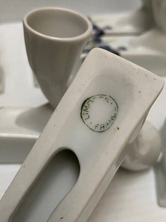 PORTES COUTEAUX EN PORCELAINE 