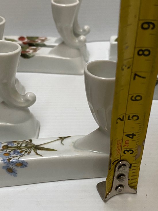 PORTES COUTEAUX EN PORCELAINE 