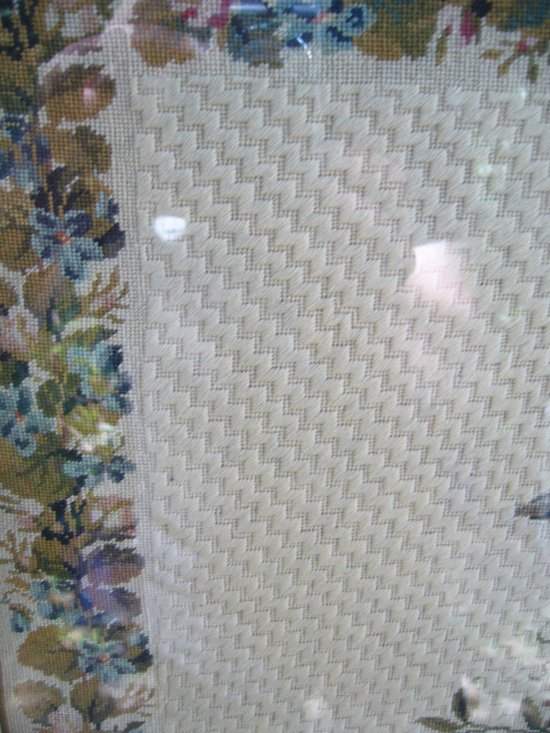 Embroidery framed with a flowered basket and birds, 19th century