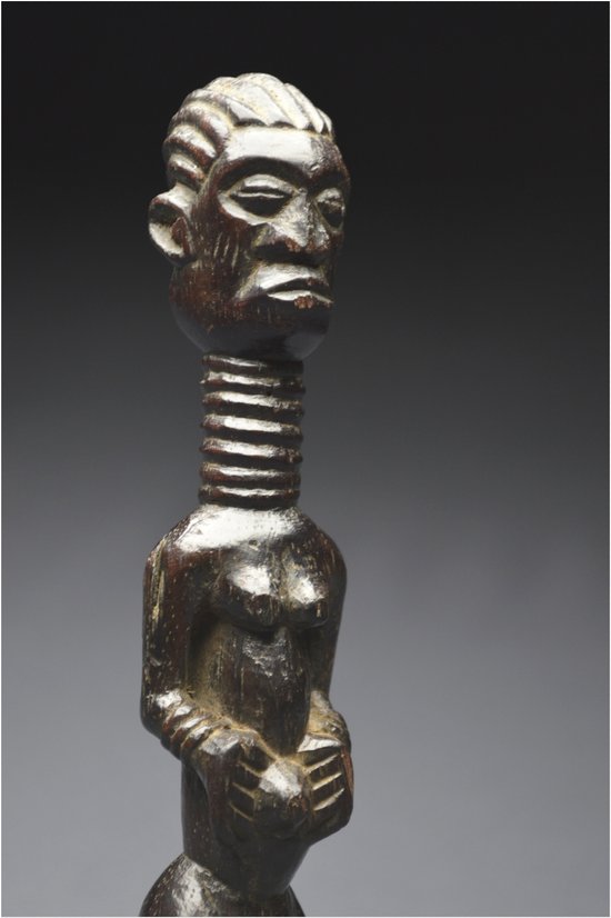 Democratic Republic of Congo (ex Zaire), Ndengese people, Mid 20th century, Ancient anthropomorphic fetish in wood with shiny patina