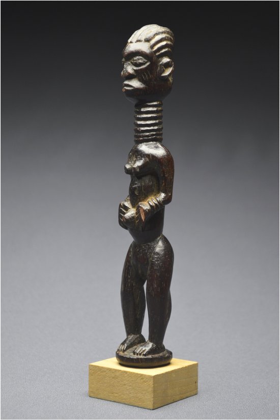 Democratic Republic of Congo (ex Zaire), Ndengese people, Mid 20th century, Ancient anthropomorphic fetish in wood with shiny patina