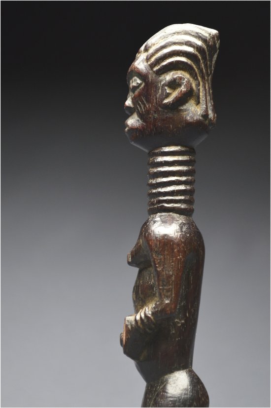 Democratic Republic of Congo (ex Zaire), Ndengese people, Mid 20th century, Ancient anthropomorphic fetish in wood with shiny patina