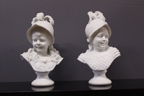 Pair Of Cookies Representing Helmeted Children