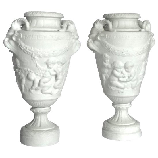 Pair of cookie vases after Clodion