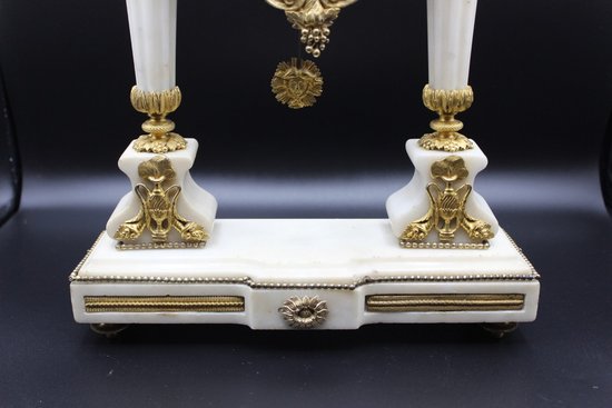 Late Louis XVI Period Portico Clock In Marble And Gilt Bronze