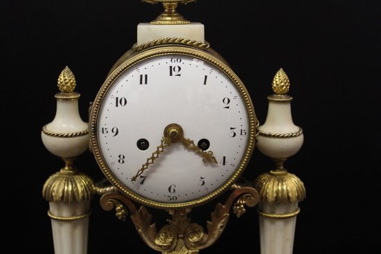 Late Louis XVI Period Portico Clock In Marble And Gilt Bronze