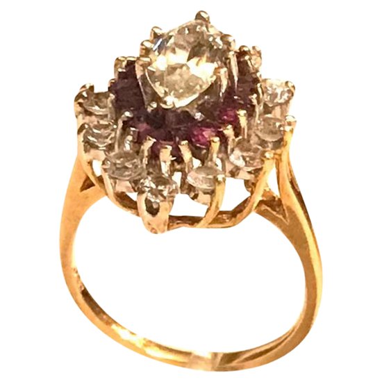 Marquise ring in gold, ruby, and circonium oxide