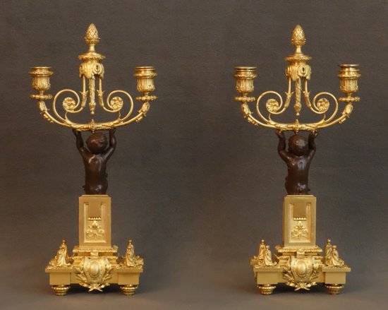  Coppia di candelabri con fauni XIX secolo