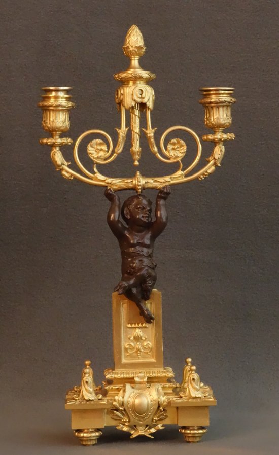  Coppia di candelabri con fauni XIX secolo